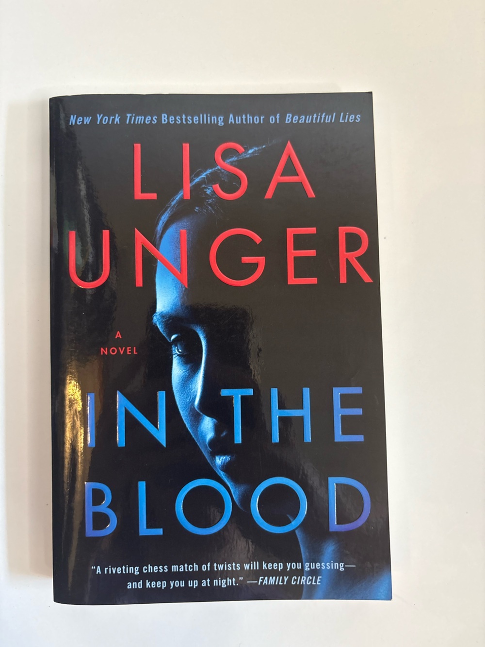 3/$20 Lisa Unger "In the Blood" paperback Book - Black with Red & Blue Cover
